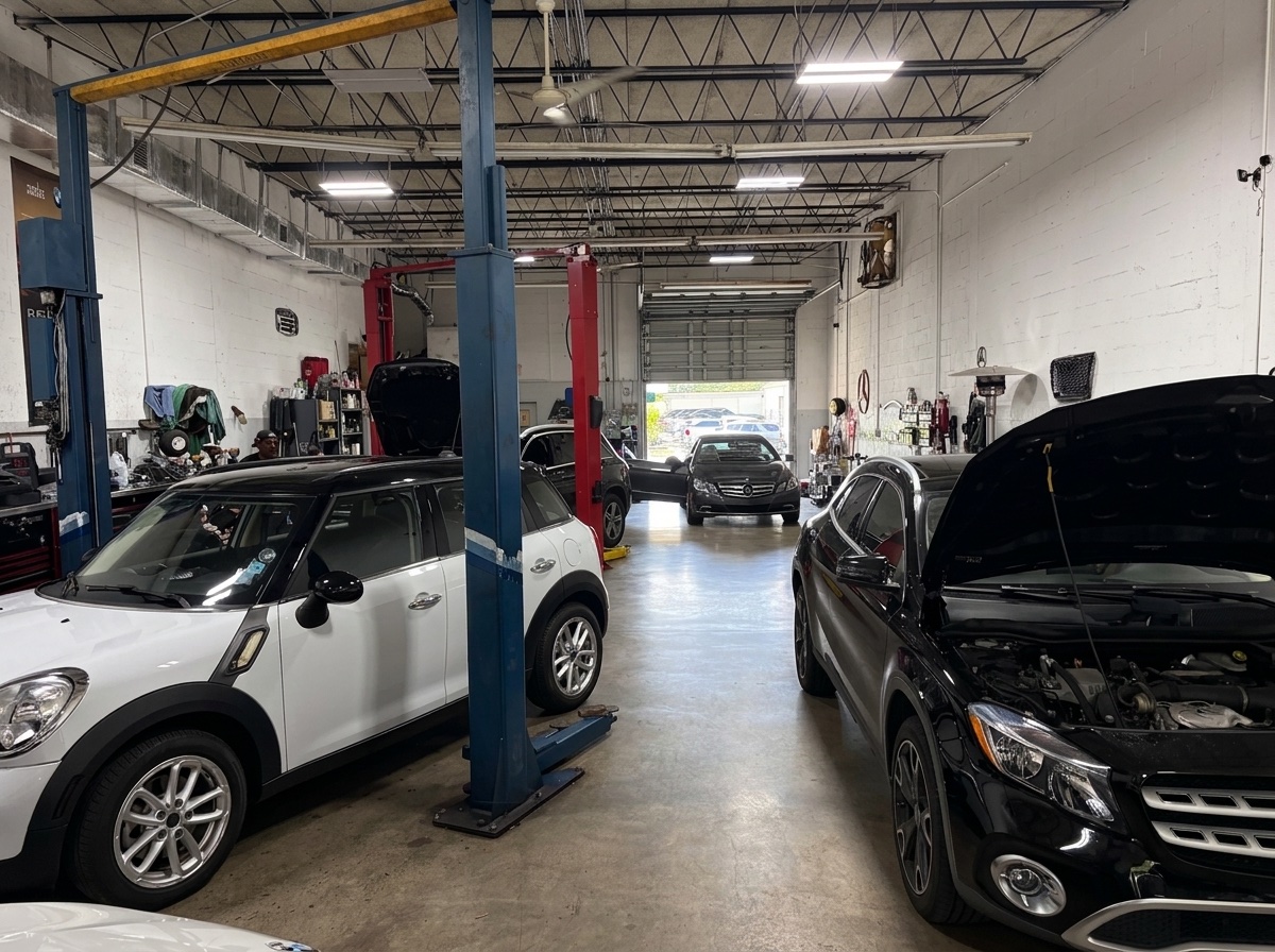 Inside our Boca Raton shop — MINI on the lift, Mercedes-Benz in for service